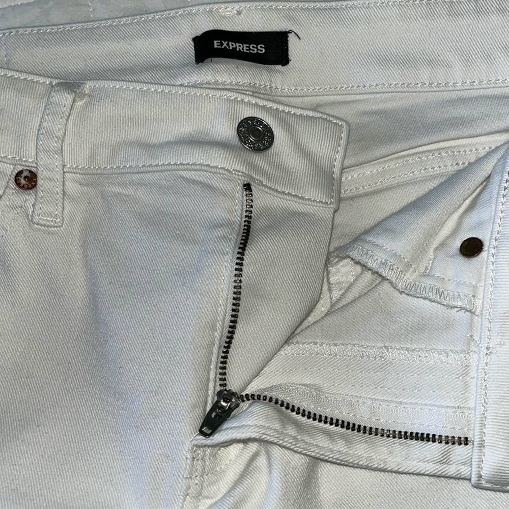 Express Mid Rise White Ripped Boyfriend
Jeans
